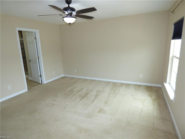521 Simpson Ln, Chesapeake, VA 23323 - empty room featuring ceiling fan, light carpet, healthy amount of natural light, and baseboards