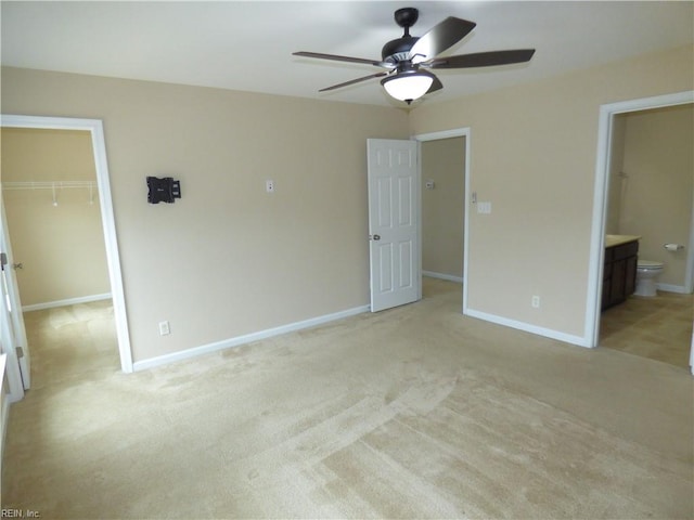 521 Simpson Ln, Chesapeake, VA 23323 - unfurnished bedroom featuring a spacious closet, light colored carpet, a closet, ensuite bath, and baseboards