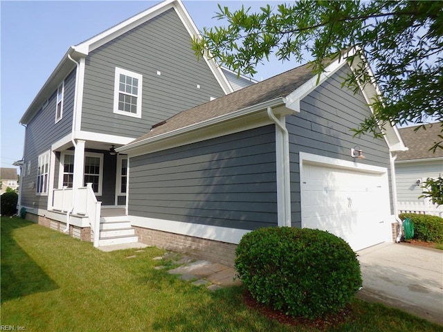 521 Simpson Ln, Chesapeake, VA 23323 - view of side of home featuring a lawn, a garage, driveway, and roof with shingles