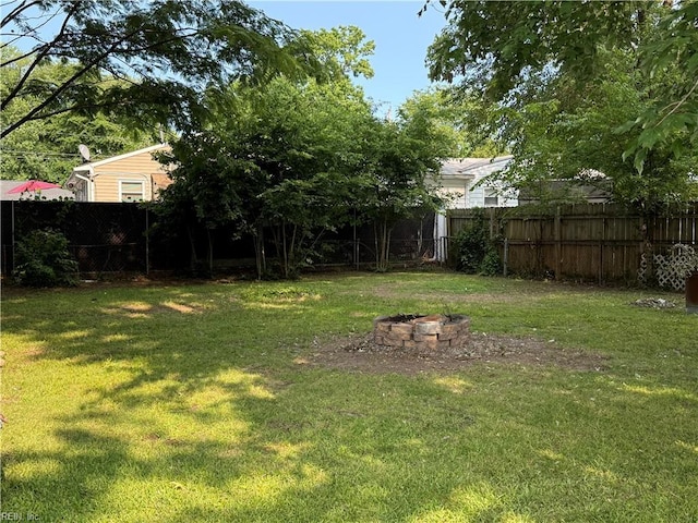 138 Ransone St, Hampton, VA 23669 - view of yard featuring a fire pit