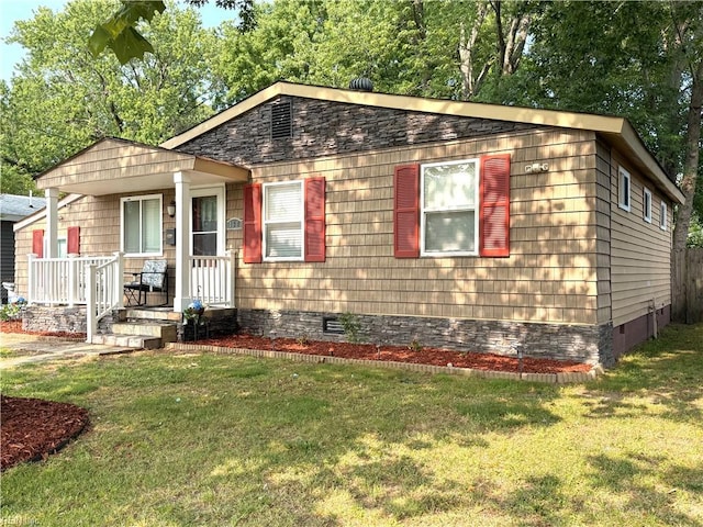 138 Ransone St, Hampton, VA 23669 - view of front of house with crawl space, a front lawn, and a porch