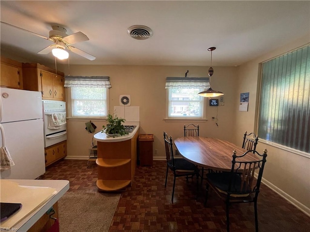 5972 Lockamy Ln, Norfolk, VA 23502 - dining area with baseboards and ceiling fan