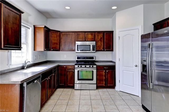 225 Quarterpath Rd, Williamsburg, VA 23185 - kitchen with stainless steel appliances, a sink, light tile patterned floors, and recessed lighting