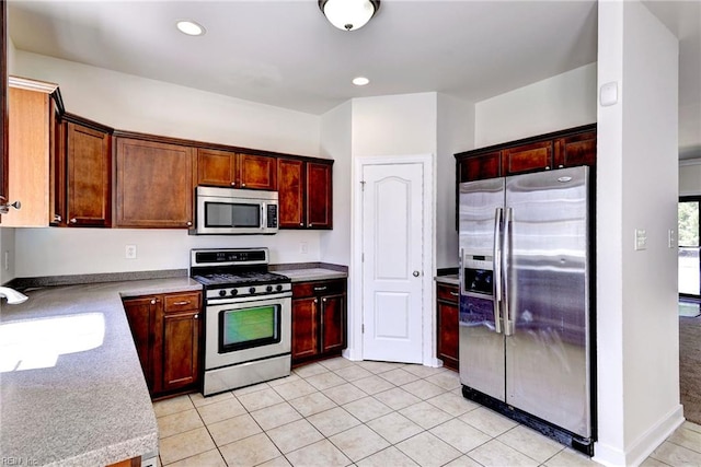 225 Quarterpath Rd, Williamsburg, VA 23185 - kitchen with stainless steel appliances, a sink, light countertops, recessed lighting, and light tile patterned floors