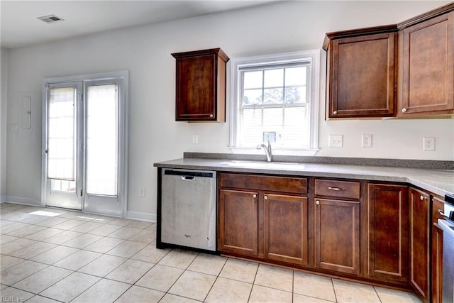 225 Quarterpath Rd, Williamsburg, VA 23185 - kitchen with dishwasher, a sink, light tile patterned floors, baseboards, and range