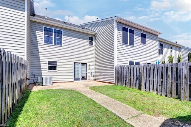 225 Quarterpath Rd, Williamsburg, VA 23185 - rear view of house featuring a patio and central AC unit