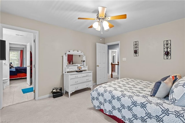 122 Merchant Man Ct, Williamsburg, VA 23185 - bedroom with light carpet, baseboards, and a ceiling fan
