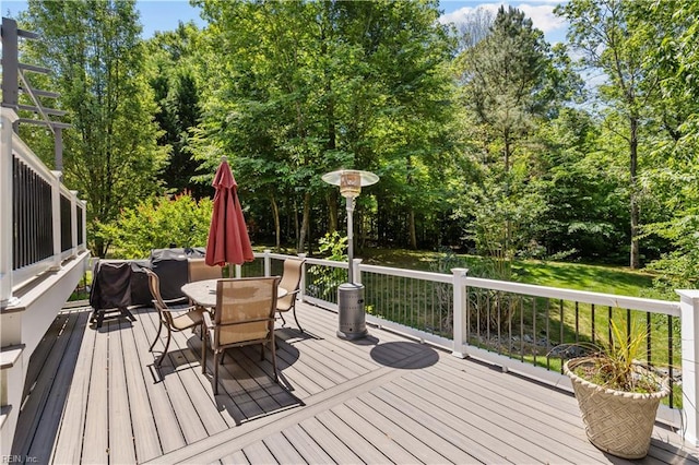 122 Merchant Man Ct, Williamsburg, VA 23185 - wooden terrace featuring outdoor dining space and view of scattered trees
