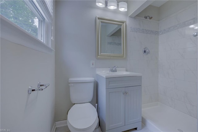 3096 Kenelm Dr, Chesapeake, VA 23323 - bathroom with a tile shower, toilet, and vanity