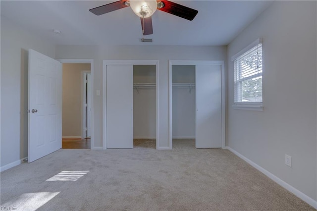 3096 Kenelm Dr, Chesapeake, VA 23323 - unfurnished bedroom with multiple closets, carpet, a ceiling fan, and baseboards