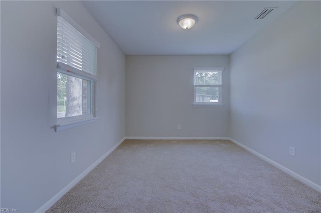 3096 Kenelm Dr, Chesapeake, VA 23323 - empty room with light carpet and baseboards