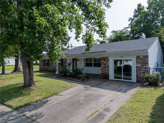 3096 Kenelm Dr, Chesapeake, VA 23323 - ranch-style house with a front yard, brick siding, and a shingled roof