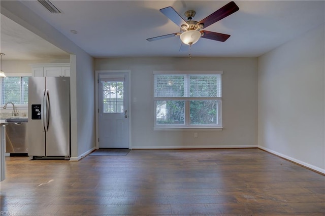 3096 Kenelm Dr, Chesapeake, VA 23323 - kitchen with stainless steel appliances, healthy amount of natural light, white cabinetry, and wood-type flooring