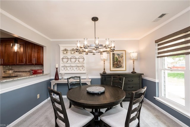 2617 Killey Ct, Virginia Beach, VA 23453 - dining room with a chandelier, light carpet, baseboards, and crown molding