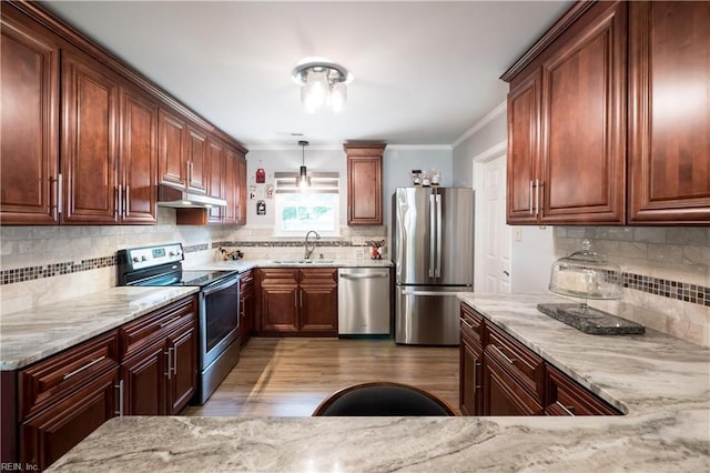 2617 Killey Ct, Virginia Beach, VA 23453 - kitchen featuring appliances with stainless steel finishes, a sink, under cabinet range hood, light stone countertops, and tasteful backsplash