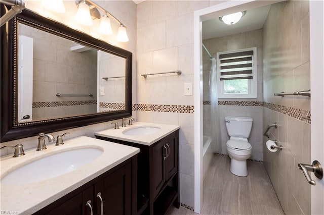 2617 Killey Ct, Virginia Beach, VA 23453 - full bath with tile walls, vanity, toilet, and shower / bath combo
