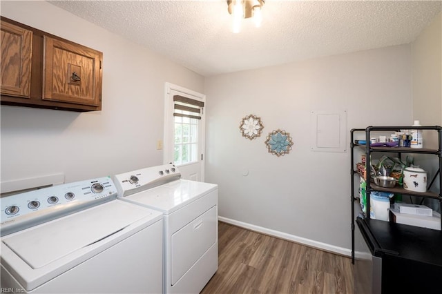 2617 Killey Ct, Virginia Beach, VA 23453 - washroom with cabinet space, washing machine and dryer, wood finished floors, a textured ceiling, and electric panel