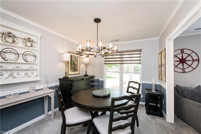 2617 Killey Ct, Virginia Beach, VA 23453 - dining space featuring a chandelier, light carpet, ornamental molding, and baseboards