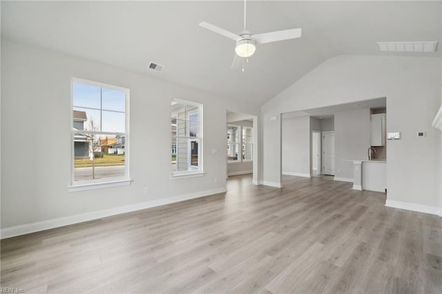 2140 Edwin Dr, Chesapeake, VA 23322 - unfurnished living room with vaulted ceiling, ceiling fan, light wood-type flooring, and baseboards