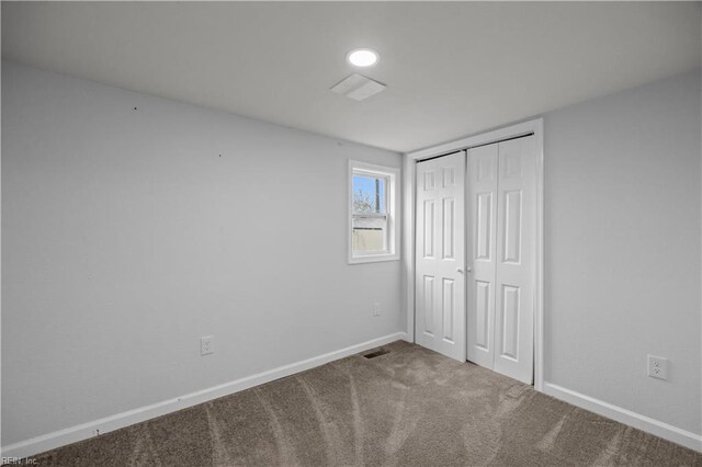 1305 Canary Dr, Virginia Beach, VA 23453 - unfurnished bedroom with baseboards, carpet, and a closet