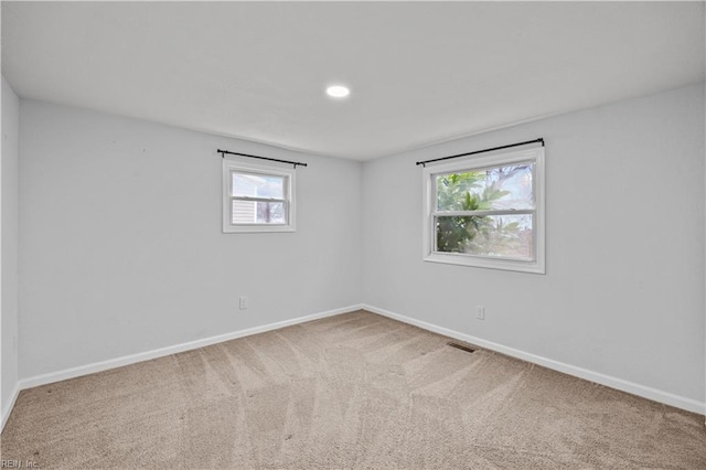 1305 Canary Dr, Virginia Beach, VA 23453 - spare room featuring baseboards and carpet