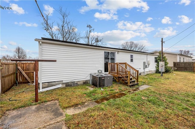 1305 Canary Dr, Virginia Beach, VA 23453 - back of property featuring central AC unit