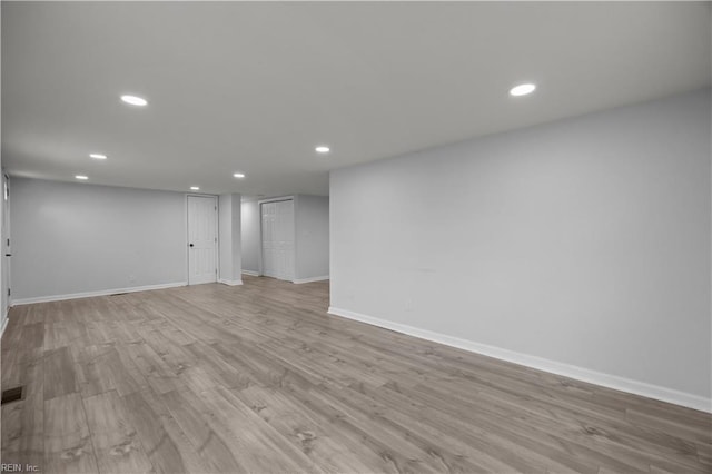 1305 Canary Dr, Virginia Beach, VA 23453 - spare room featuring recessed lighting, baseboards, and wood finished floors