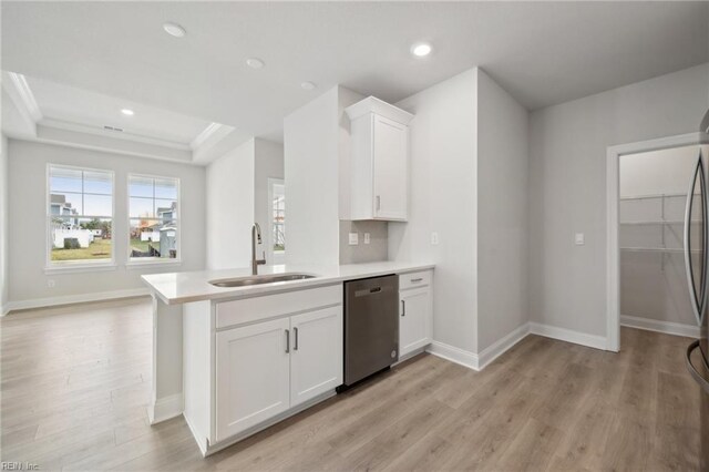 2142 Edwin Dr, Chesapeake, VA 23322 - kitchen featuring stainless steel dishwasher, a sink, light wood finished floors, white cabinetry, and recessed lighting
