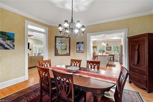 3321 Tyre Neck Rd, Chesapeake, VA 23321 - dining area with light wood-style floors, ornamental molding, a chandelier, and baseboards
