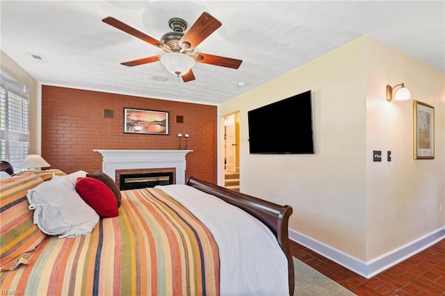 3321 Tyre Neck Rd, Chesapeake, VA 23321 - bedroom featuring baseboards, brick patterned floors, ceiling fan, a brick fireplace, and connected bathroom