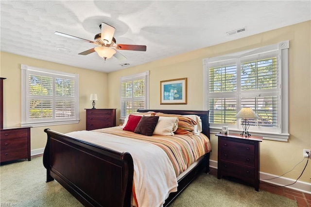 3321 Tyre Neck Rd, Chesapeake, VA 23321 - bedroom featuring baseboards, multiple windows, and ceiling fan