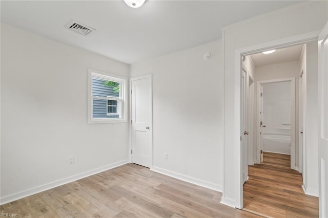 436 Smiley Rd, Hampton, VA 23663 - unfurnished bedroom featuring light wood-type flooring and baseboards