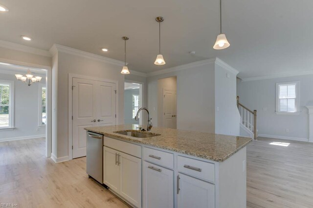 2246 Captiva Ln, Chesapeake, VA 23321 - kitchen featuring a sink, stainless steel dishwasher, light wood-type flooring, baseboards, and ornamental molding