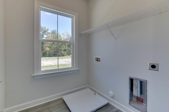 2246 Captiva Ln, Chesapeake, VA 23321 - laundry room with hookup for an electric dryer, hookup for a washing machine, hookup for a gas dryer, baseboards, and wood finished floors