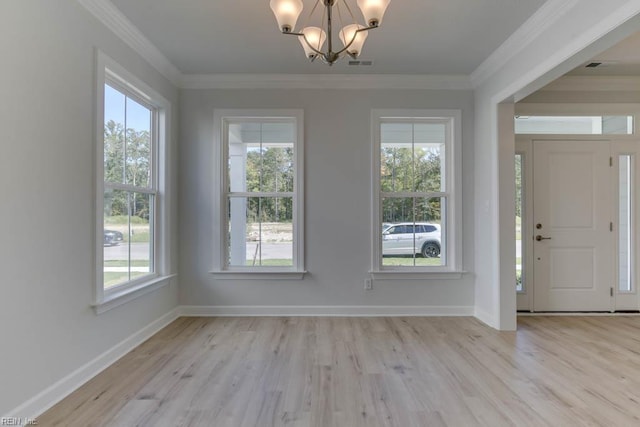2246 Captiva Ln, Chesapeake, VA 23321 - foyer featuring a chandelier, light wood finished floors, baseboards, and crown molding