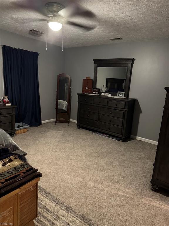 412 Joseph Topping Dr, Poquoson, VA 23662 - bedroom with a textured ceiling, light colored carpet, baseboards, and a ceiling fan