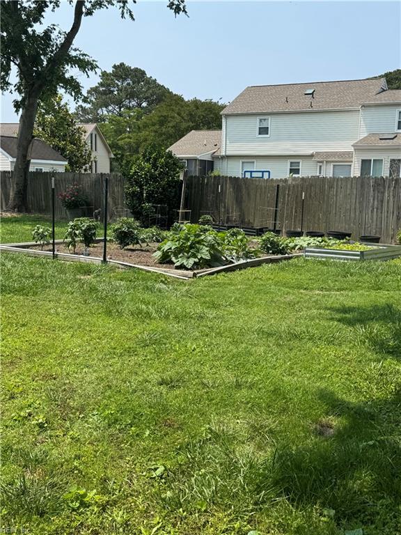 412 Joseph Topping Dr, Poquoson, VA 23662 - view of yard with a vegetable garden