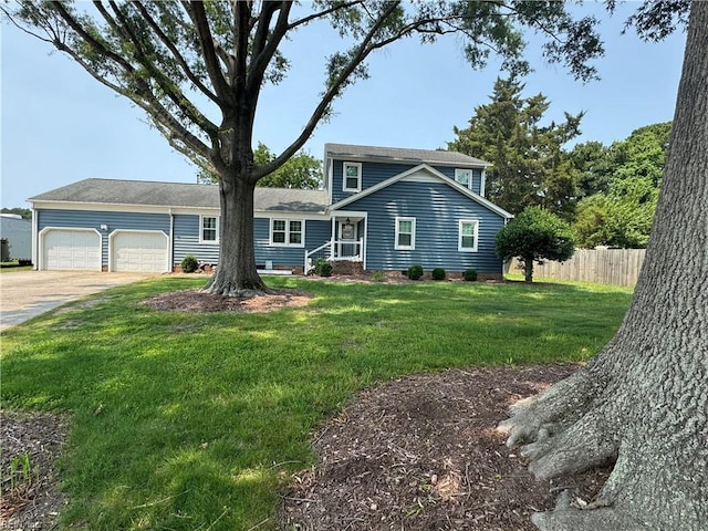 412 Joseph Topping Dr, Poquoson, VA 23662 - traditional-style home with a garage and concrete driveway