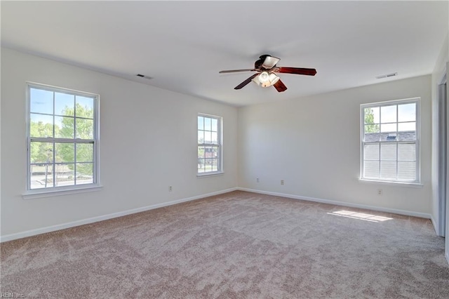 735 Great Marsh Ave, Chesapeake, VA 23320 - unfurnished room with healthy amount of natural light, a ceiling fan, and carpet flooring
