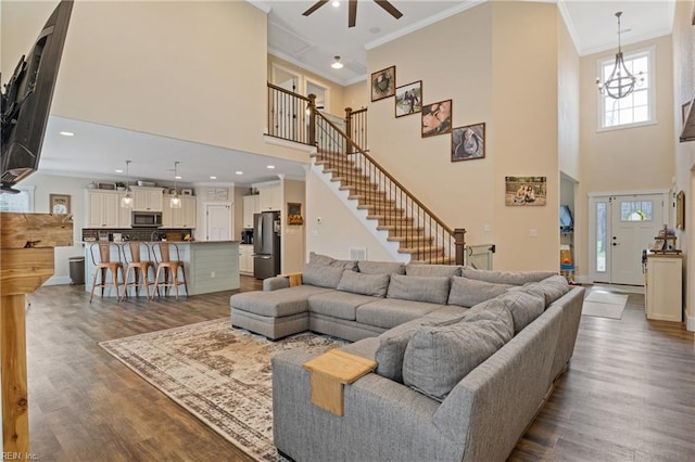 115 Cooks Landing Rd, Camden, NC 27921 - living area with ornamental molding, a high ceiling, a ceiling fan, dark wood finished floors, and stairs