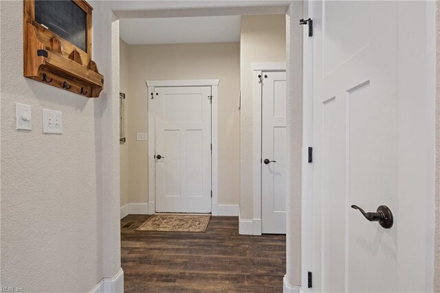 115 Cooks Landing Rd, Camden, NC 27921 - hall featuring dark wood finished floors and baseboards