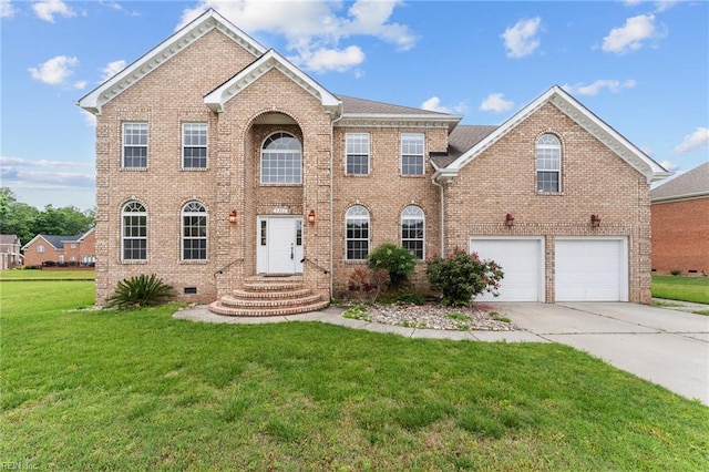 3353 Star Creek Ct, Suffolk, VA 23435 - colonial house featuring concrete driveway, brick siding, a front yard, an attached garage, and crawl space