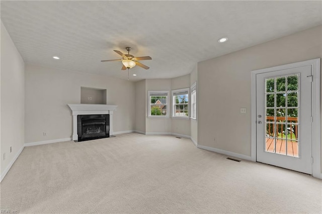 3353 Star Creek Ct, Suffolk, VA 23435 - unfurnished living room with a ceiling fan, baseboards, light carpet, a fireplace with flush hearth, and recessed lighting