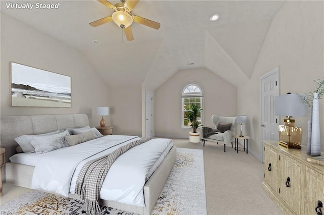 3353 Star Creek Ct, Suffolk, VA 23435 - bedroom with light colored carpet, vaulted ceiling, ceiling fan, and baseboards