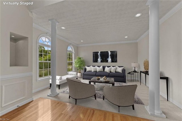 3353 Star Creek Ct, Suffolk, VA 23435 - living room featuring decorative columns, ornamental molding, recessed lighting, wood finished floors, and baseboards