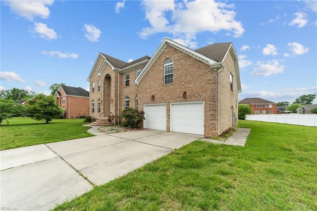 3353 Star Creek Ct, Suffolk, VA 23435 - view of front of home featuring a garage, brick siding, and driveway