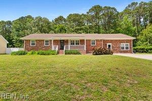 4901 Lake Shore Dr, Chesapeake, VA 23321 - ranch-style home with a front lawn and a porch