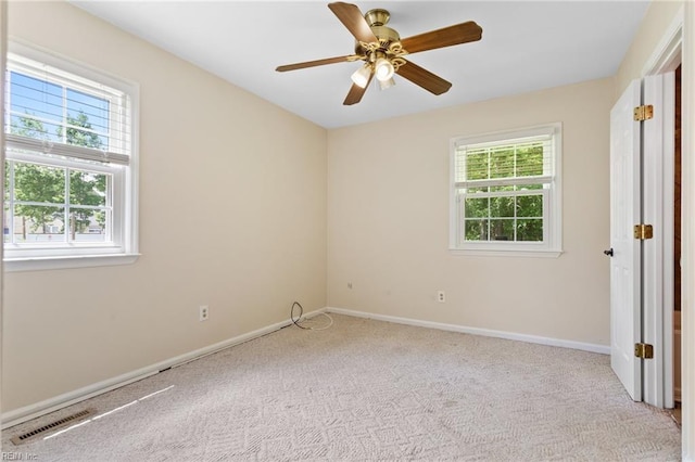 4901 Lake Shore Dr, Chesapeake, VA 23321 - carpeted empty room with healthy amount of natural light, baseboards, and a ceiling fan