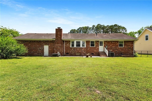 4901 Lake Shore Dr, Chesapeake, VA 23321 - rear view of property with entry steps, crawl space, a chimney, central air condition unit, and brick siding