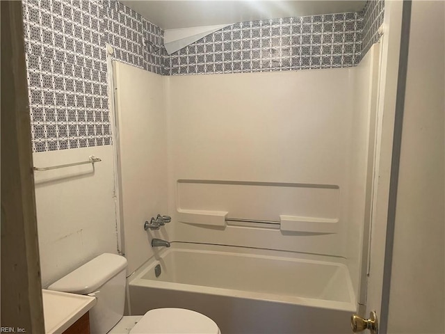 203 Windsor Ave, Smithfield, VA 23430 - full bathroom featuring toilet, tub / shower combination, vanity, and wallpapered walls